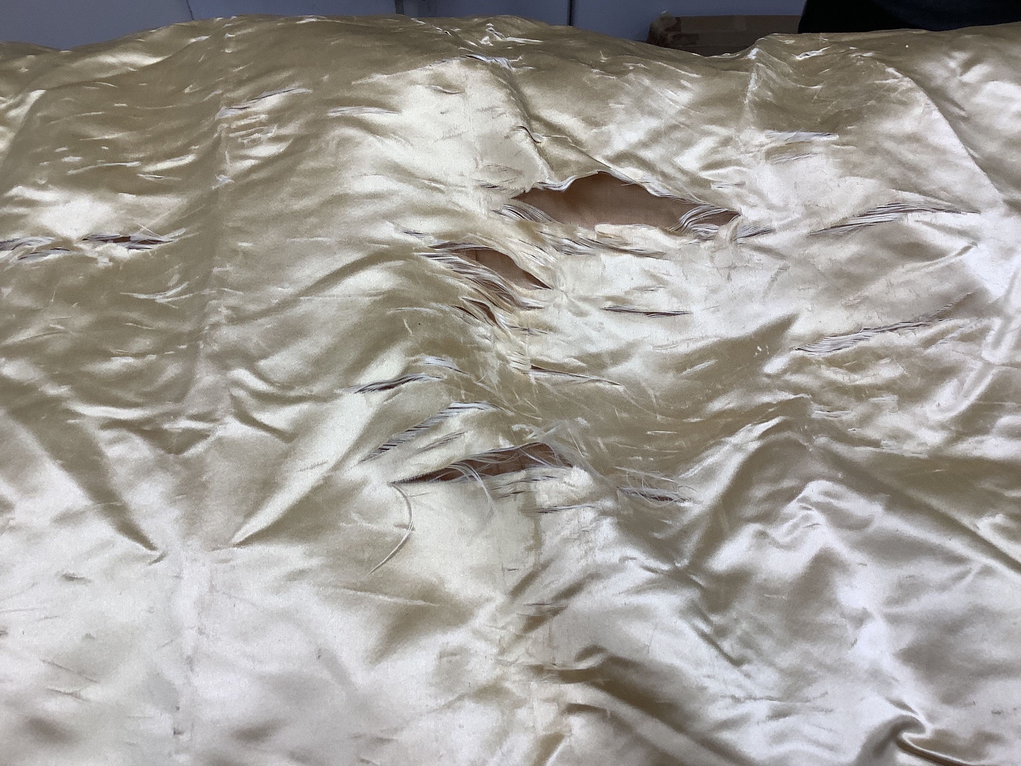 A Firth and Russell cream satin and lace wedding dress